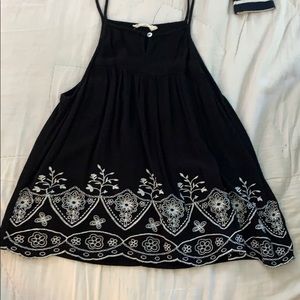 A black and white floral tank top